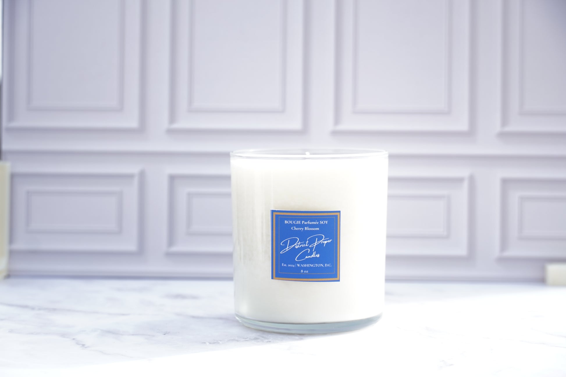 White candle in soy wax. Fragrance is cherry blossom. Smells like vanilla, lavender with a hint of cherry.