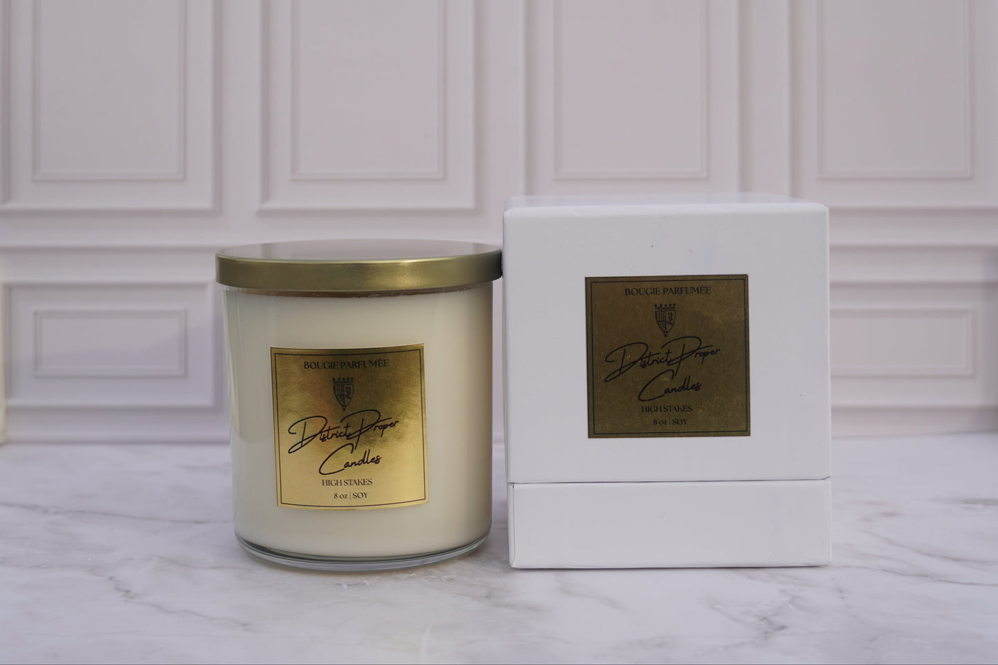 Cedarwood, spice, ocean breeze, rouge candle in clear vessel. Handpoured in soy wax. Candle with gold lid.