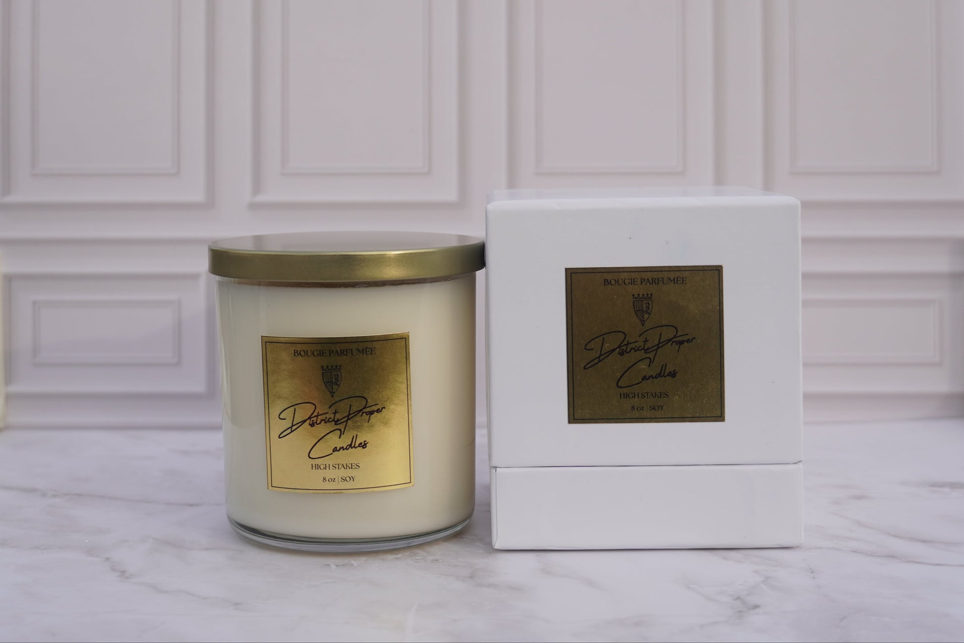 Cedarwood, spice, ocean breeze, rouge candle in clear vessel. Handpoured in soy wax. Candle with gold lid.