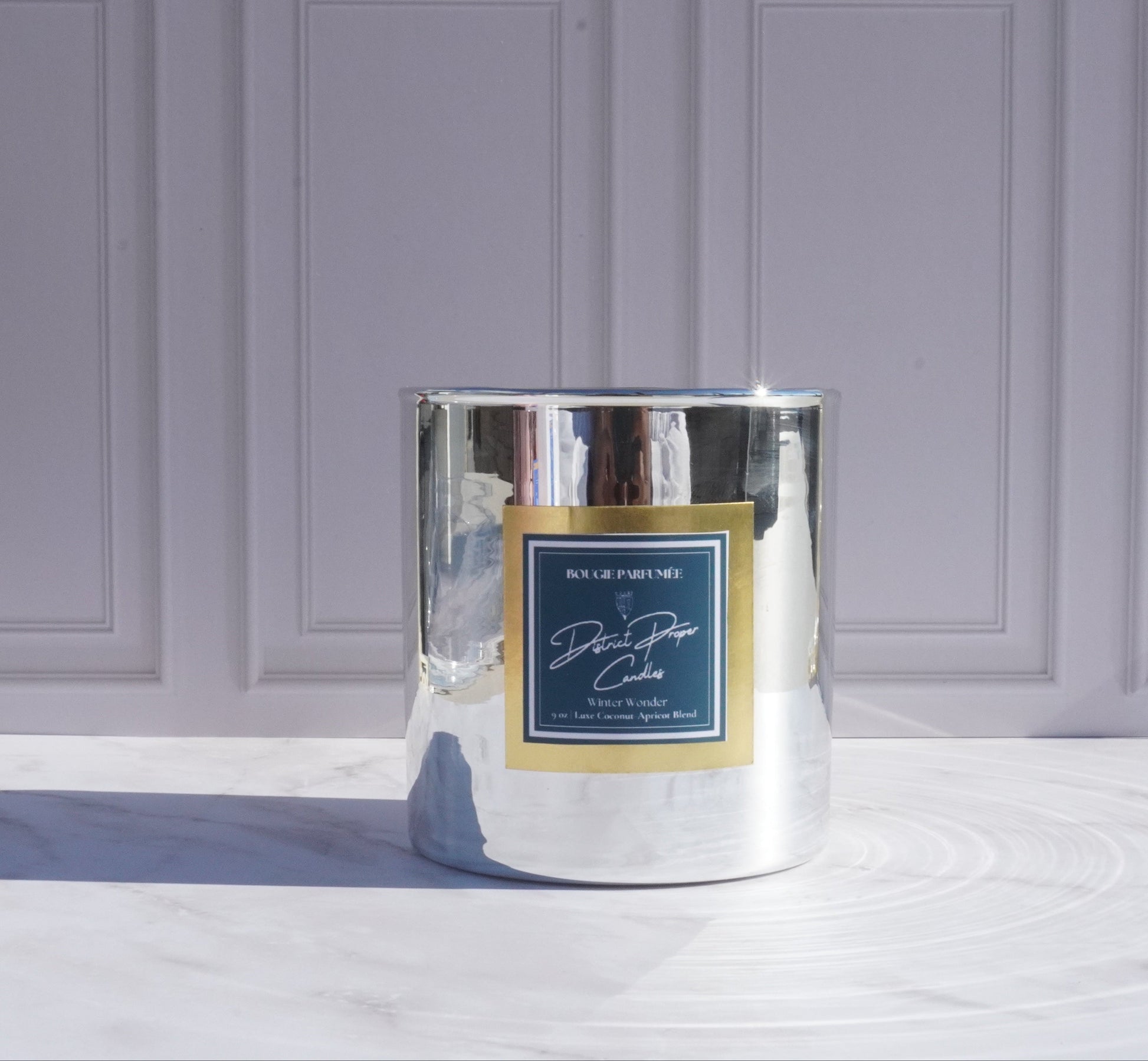 Luxury winter candle in a silver jar. Smells like pomegranate, candy apple, and luscious berries. Handpoured in coconut apricot wax.