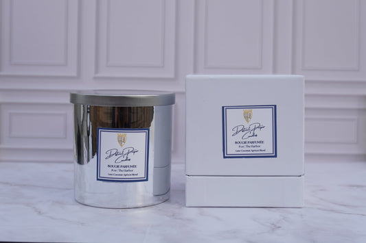 Candle in silver holder. The Harbor luxury candle in silver vessel. Smells like ocean breeze, citrus, and fresh scent or fragrance.