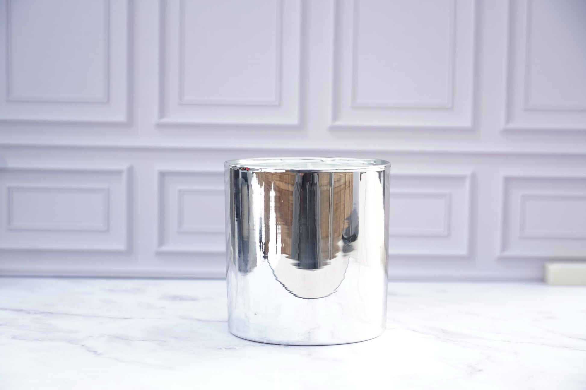 Winter candle in silver holder. Winter Wonder premium candle made in coconut apricot wax. Smells like luscious pomegranate, candy apple, and berries. 